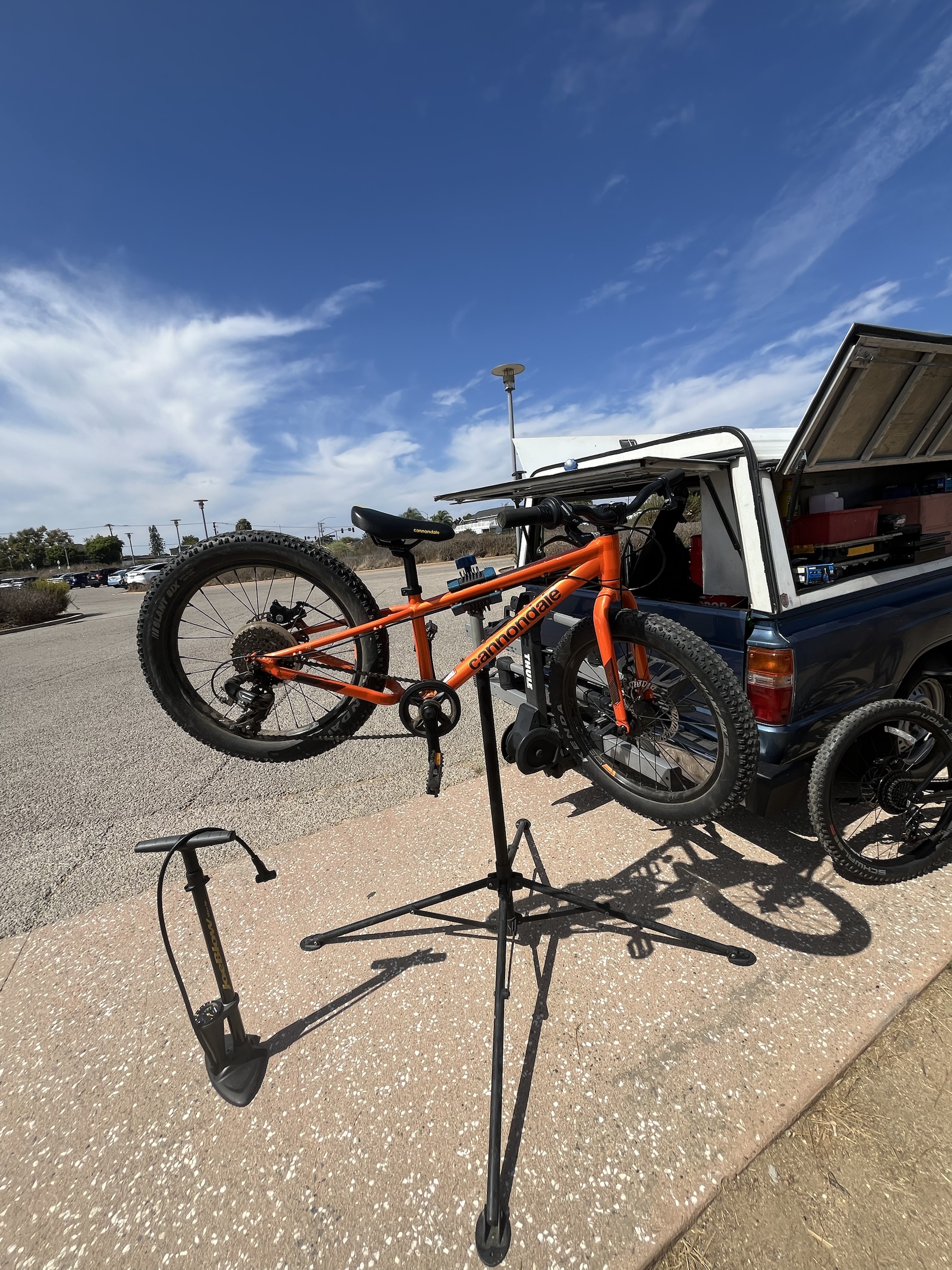 Checking a Cannondale kids' bike before the group ride